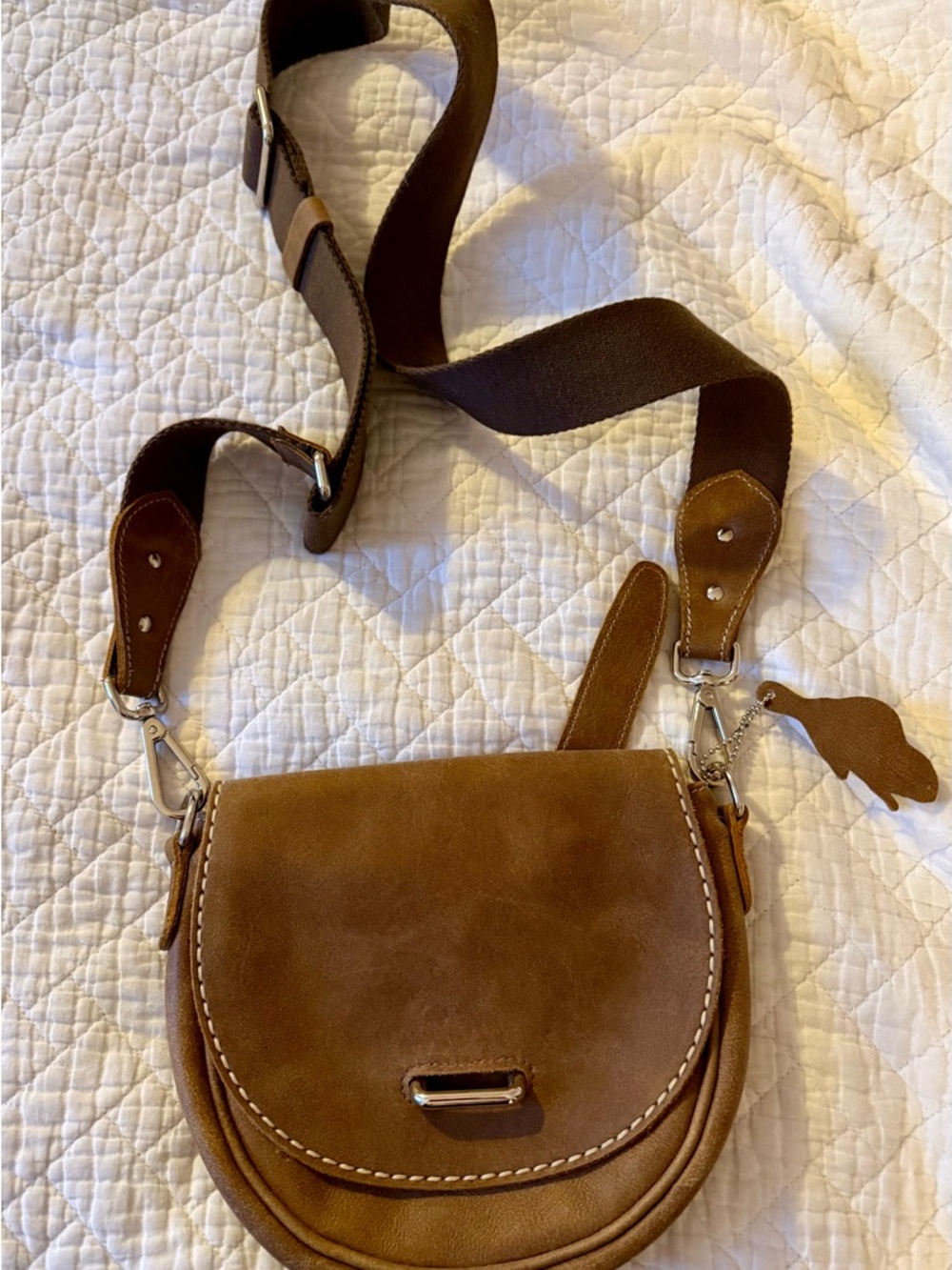 Brown Suede Saddle Crossbody Bag with Wide Strap from ROOTS